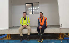 Tom Francis and Tim Sullivan in their base isolated test house