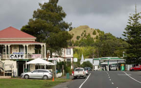 Kāeo's main street, which is also State Highway 10, with Pohue Pā in the distance.