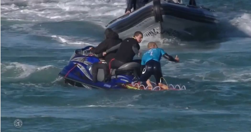 WSL footage shows Fanning being picked up by a support boat.
