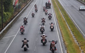 The Mongrel Mob funeral procession on State Highway 2 enroute to the Tapu Whenua Cemetery.