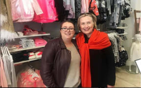 Parnell Baby Boutique assistant Kersti Wade with Hillary Clinton.