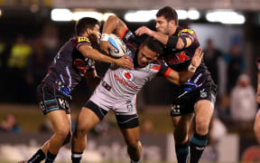 The Warriors Solomone Kata wrapped up by Penrith players