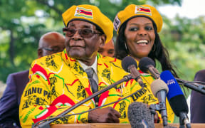 Zimbabwe's president Robert Mugabe and wife Grace Mugabe at the ruling party's headquarters last week.