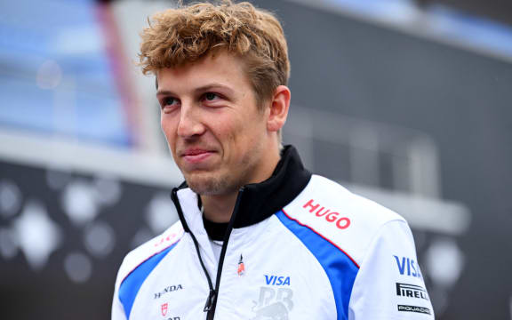 Racing Bulls driver Liam Lawson arrives in the paddock ahead of the final practice of the Las Vegas Grand Prix, at Las Vegas Strip Circuit on November 21, 2025. (Photo by Rudy Carezzevoli / GETTY IMAGES NORTH AMERICA / Getty Images via AFP)