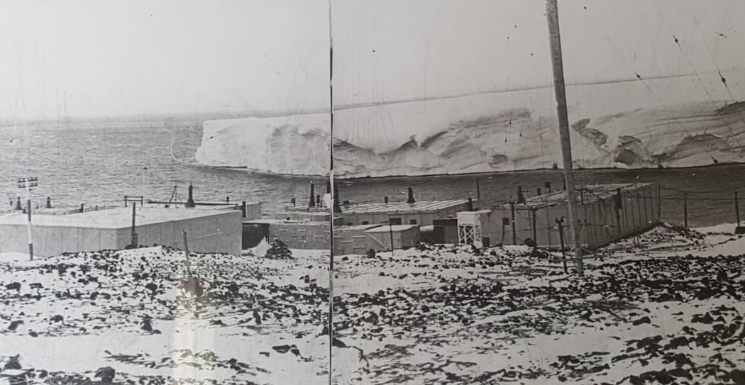 A photo of the original Scott Base built in 1957. The glacier in the background no longer exists.