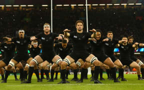 The All Blacks perform the haka before their RWC match against France in Cardiff.