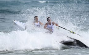 A rowing beach sprint crew in action.