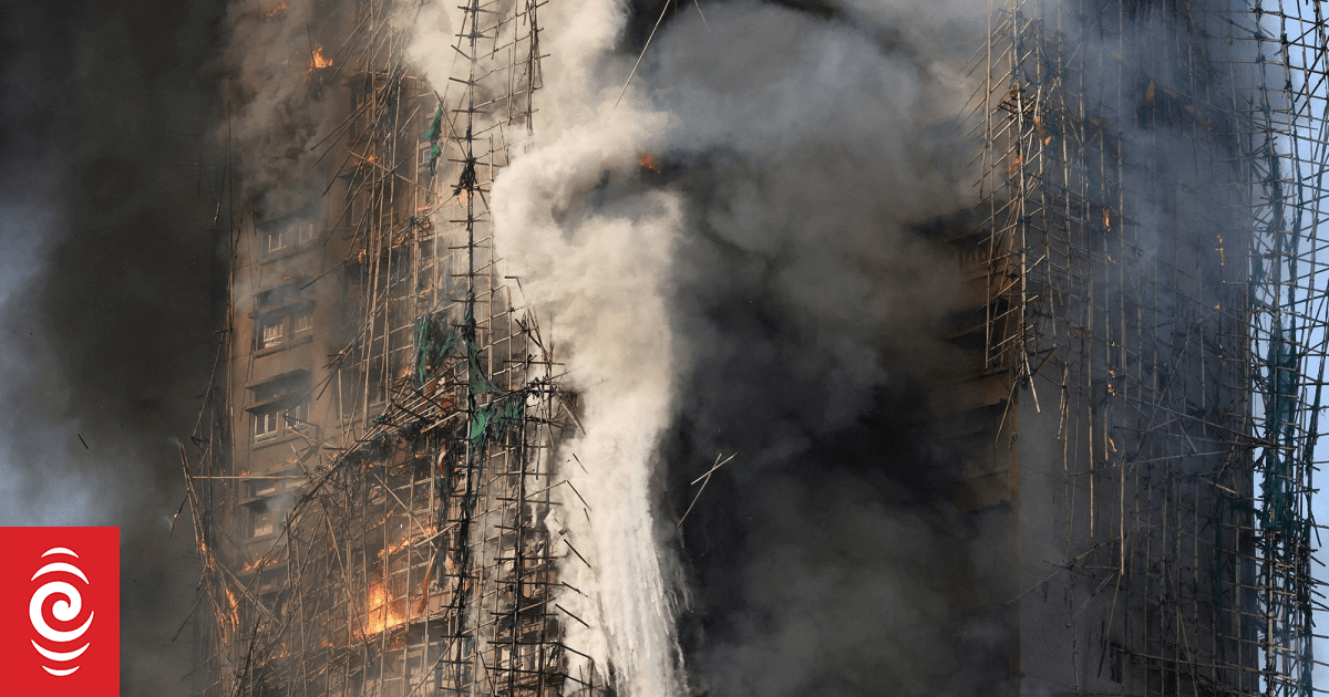 Hong Kong races to remove scaffolding nets blamed for fuelling deadly fire