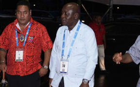 Johnny Sexwale (C), South African High Commissioner to New Zealand, Cook Islands, Fiji, Samoa and Vanuatu, arrives at the official welcome reception for the Commonwealth Heads of Government Meeting (CHOGM) in Apia on October 24, 2024. (Photo by Rick Rycroft / POOL / AFP)