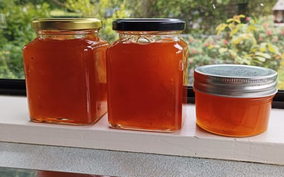 Jars of homemade apricot jam.