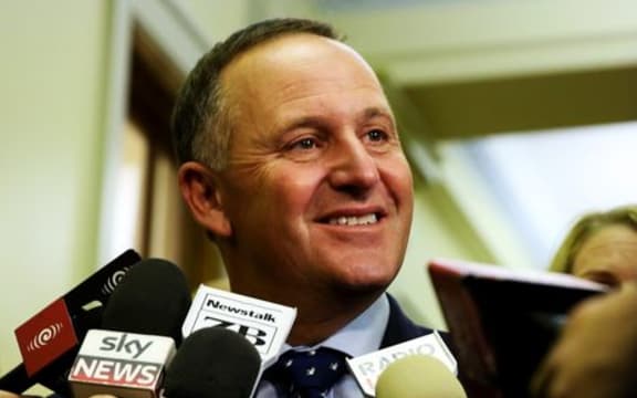 John Key in a media scrum