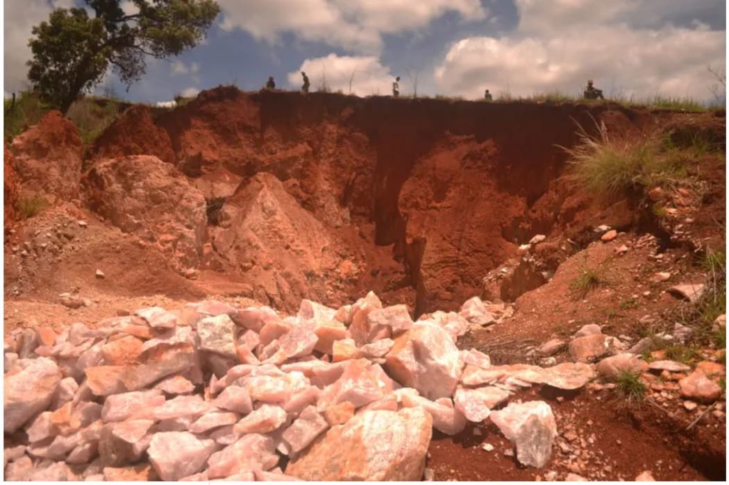 Rose quartz lies in the sun at the edge of a mine near Anjoma Ramartina.