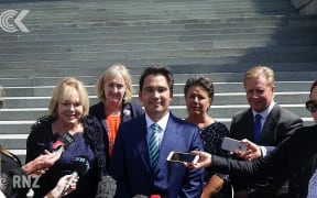 Senior National MPs present united post shuffle front