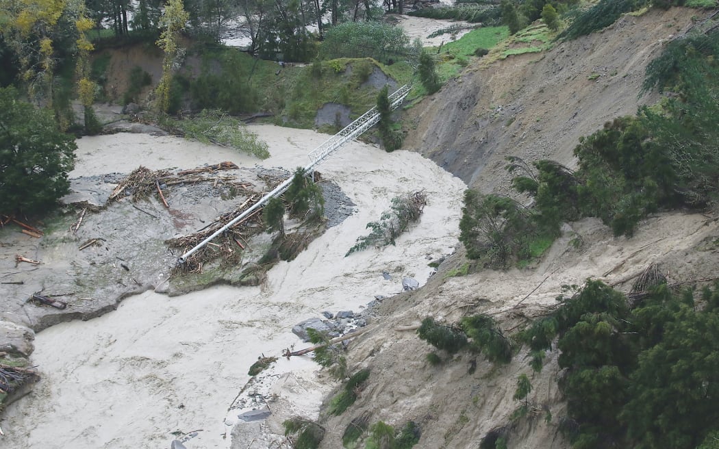 Urgent repair work is under way on the pipe that brings the city’s water supply from Waingake. Debris brought down in Cyclone Gabrielle can be seen under and around the pipe.