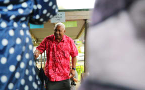 Frank Bainimarama on his way to cast his vote