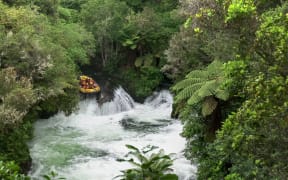 Whitewater rafting at Kaituna Waterfall in the North Island.