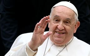 Pope Francis pictured waving in December, 2024.