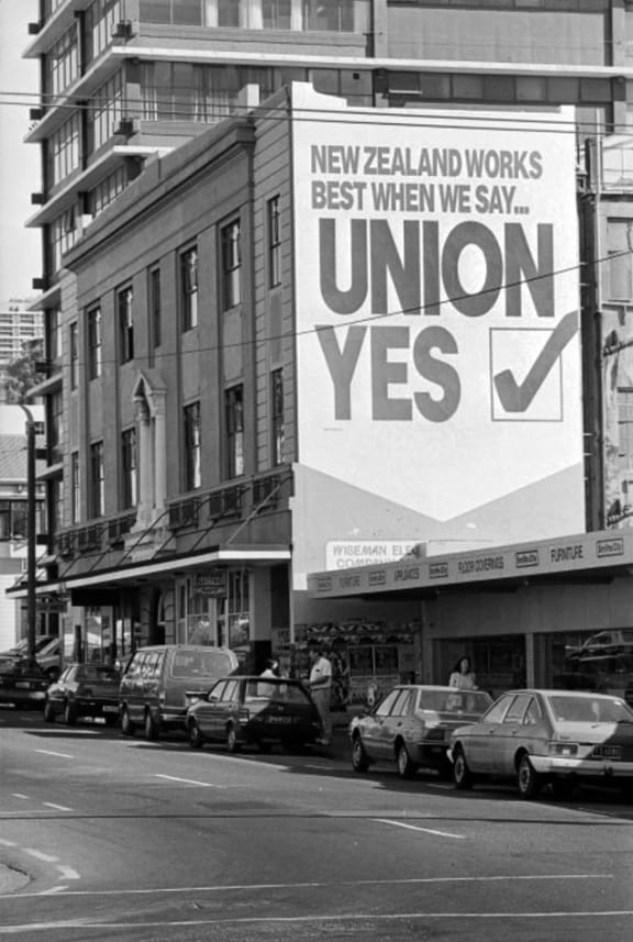 Trades Hall, with union slogan.