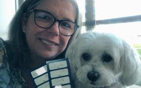 Lisa Robinson was twice denied flying with her assistance dog Lilly by Air New Zealand.