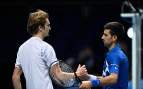 Alexander Zverev (L) and Novak Djokovic.