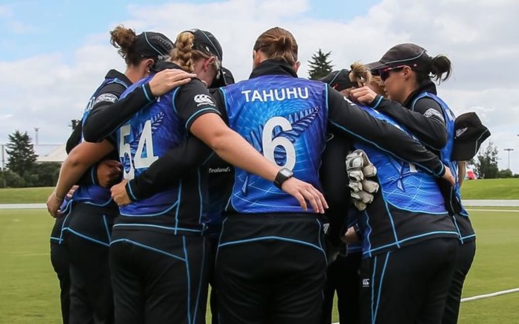 The White Ferns huddle before a match, 2016