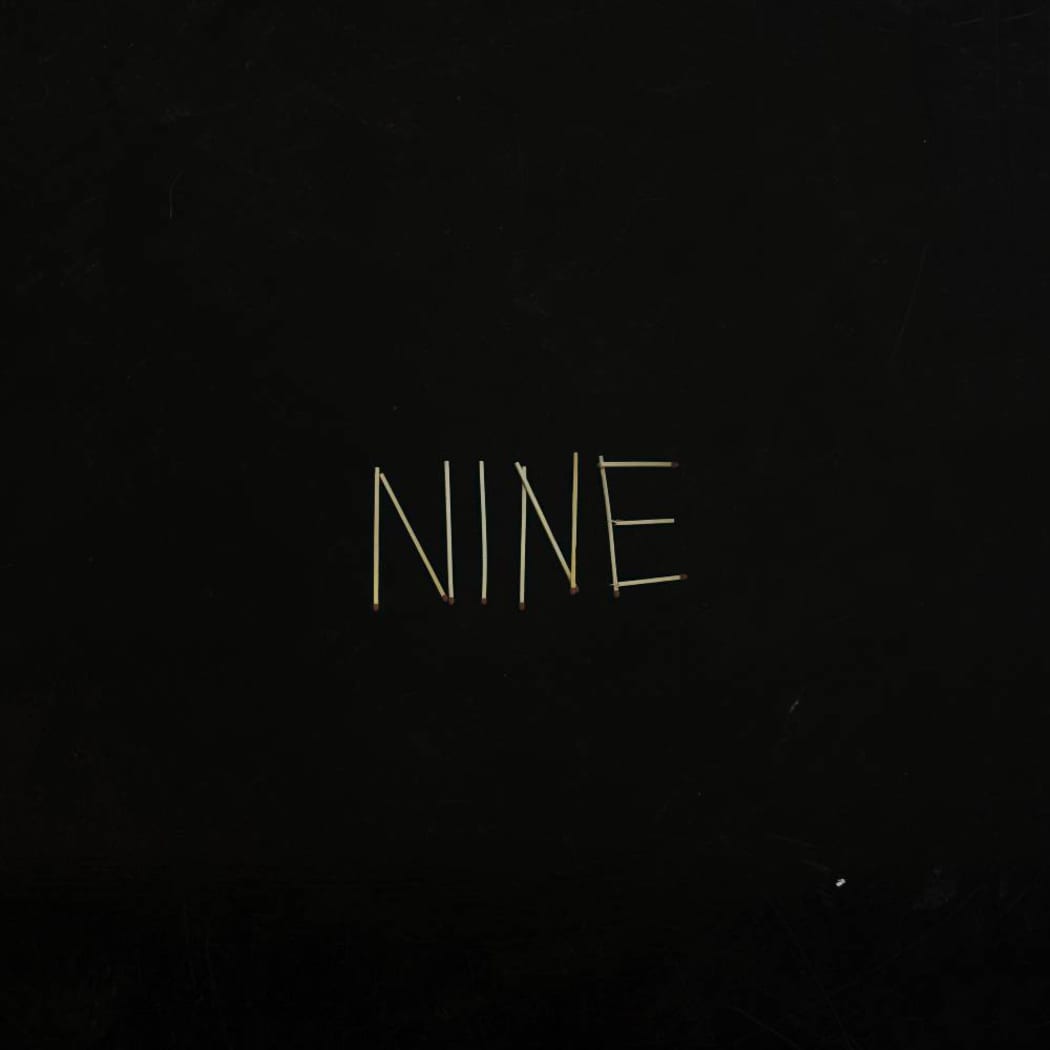 NINE cover art
