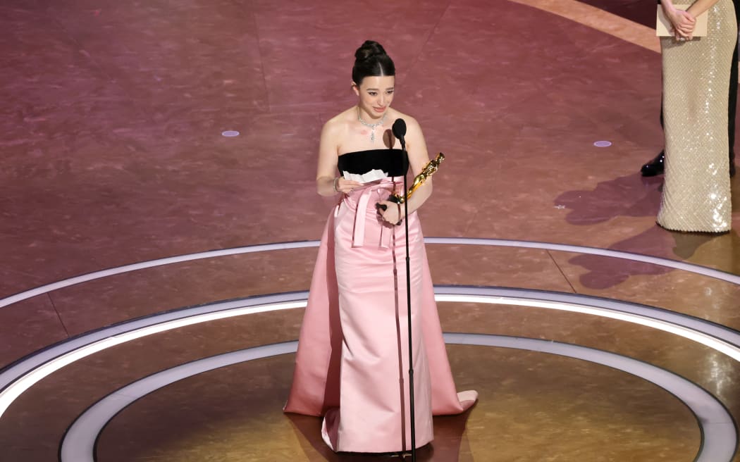 HOLLYWOOD, CALIFORNIA - MARCH 02: Mikey Madison accepts the Best Actress In A Leading Role award for "Anora" onstage during the 97th Annual Oscars at Dolby Theatre on March 02, 2025 in Hollywood, California.   Kevin Winter/Getty Images/AFP (Photo by KEVIN WINTER / GETTY IMAGES NORTH AMERICA / Getty Images via AFP)