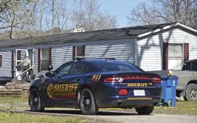 Investigators work the scene of a shooting on Saturday, Jan. 26, 2019, in Ascension Parish in Louisiana.  Authorities in Louisiana say a shooting has left five people dead in two parishes. AP)