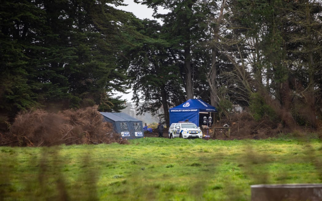 While searching private farmland in the Greenpark area in Canterbury, police found a shallow grave was discovered along the treeline.