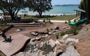 A community-built park at the southern end of Paihia’s main beach features picnic and play areas, a tube slide, barbecues, paths, plantings and a waterfall.