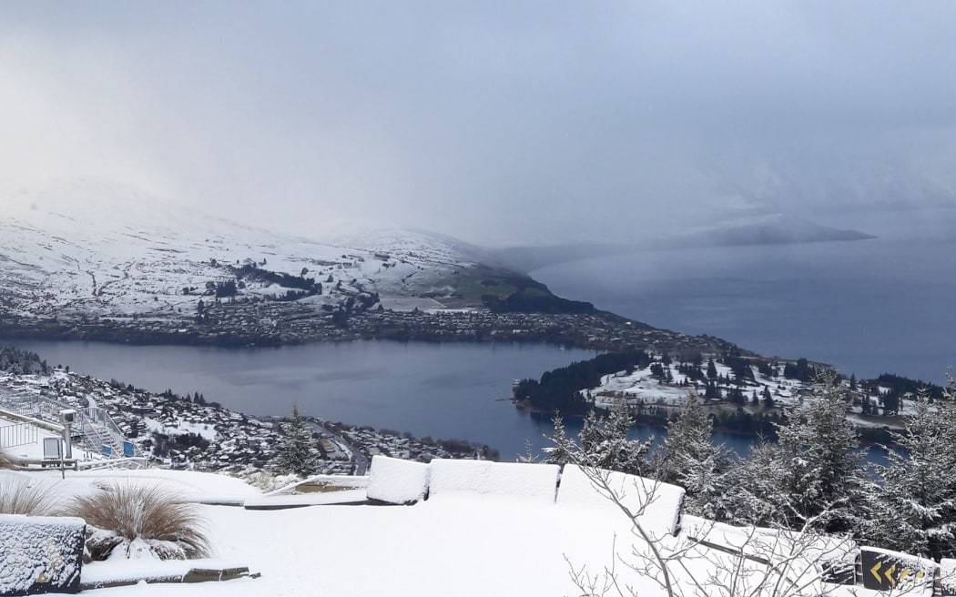 A view of Queenstown from the Queenstown Skyline, covered in snow on Wednesday morning.