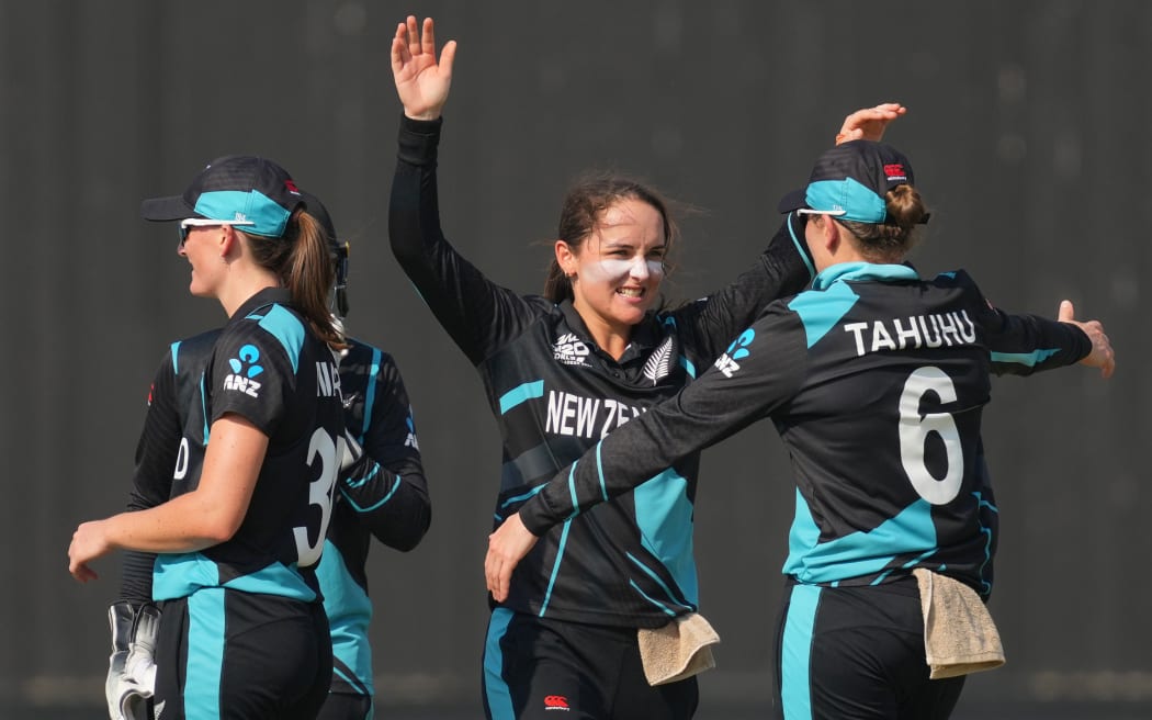 Melie Kerr and Lea Tahuhu celebrate during the White Ferns' T20 World Cup triumph in the UAE.