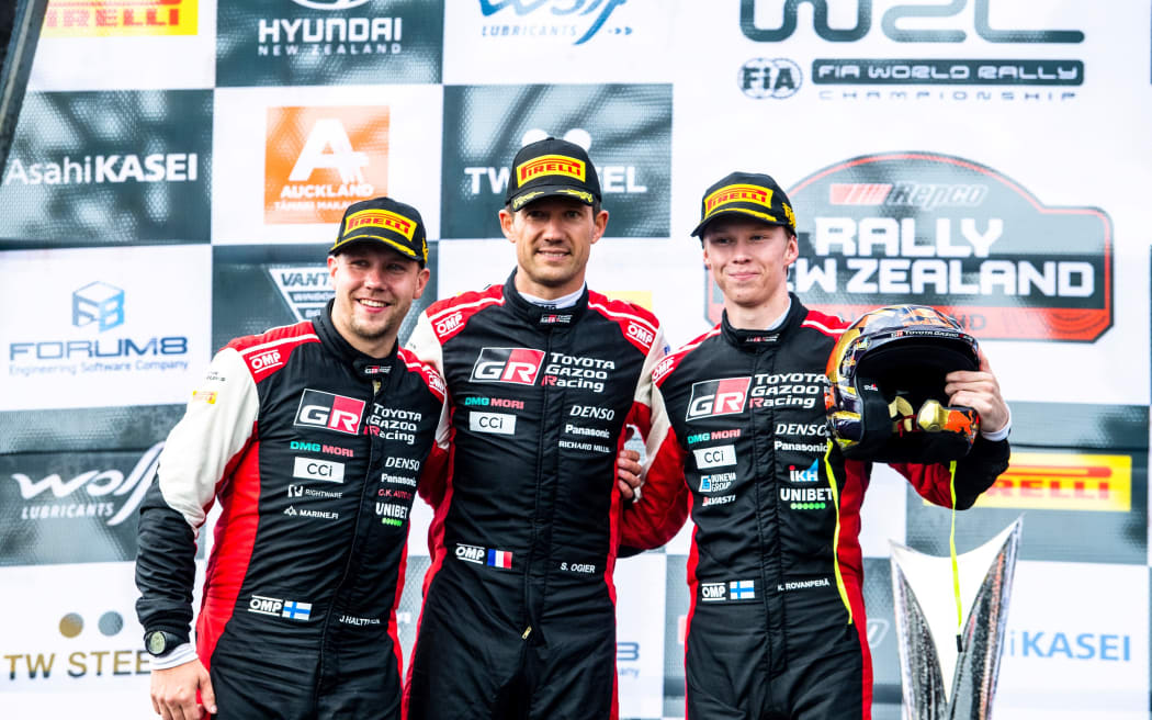 Kalle Rovanpera (FIN) and Jonne Halttunen (FIN) of team Toyota Gazoo Racing celebrate on the podium after winning their maiden FIA World Rally Championship title in Auckland, New Zealand on 2.10.2022 // Jaanus Ree / Red Bull Content Pool // SI202210020115 // Usage for editorial use only //