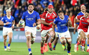 Tonga's Zane Kapeli (c) is set to miss nine months of rugby after rupturing a patellar tendon against Samoa.