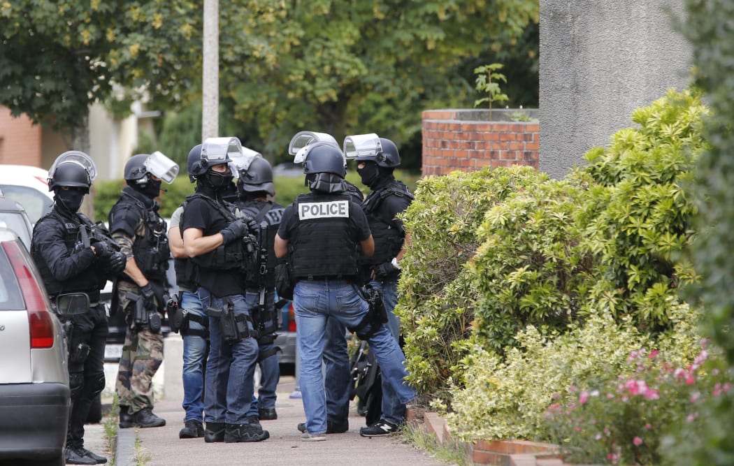 Police carried out searches in Saint-Etienne du Rouvray after the attack.