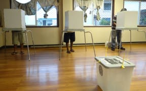 Marshall Islands voters cast their ballots at a Majuro polling station during the 2015 election