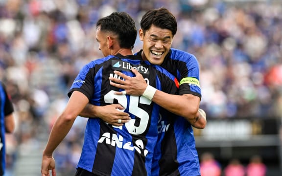 Hiroki Sakai of Auckland FC celebrates a goal by Neyder Moreno of Auckland FC.