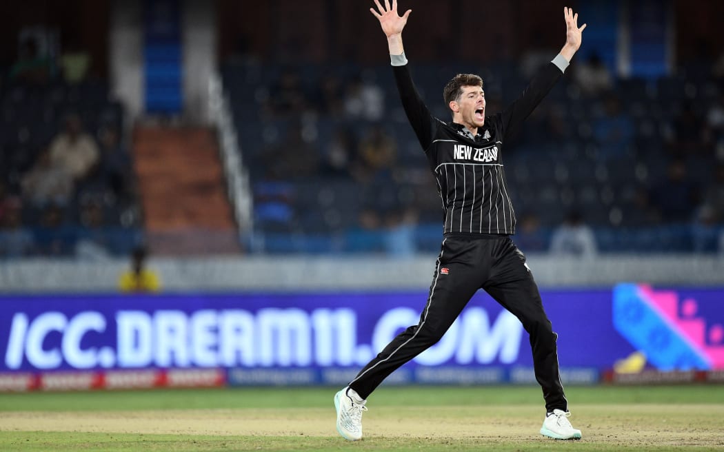 New Zealand's Mitchell Santner appeals during 2023 World Cup game against the Netherlands in Hyderabad.