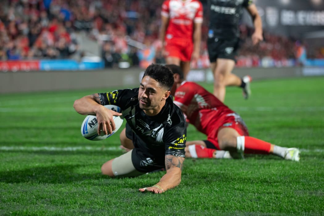 Kiwis player Shaun Johnson scores against Tonga, during rugby league Test match between Kiwis and Tonga, held at Mt Smart Stadium.