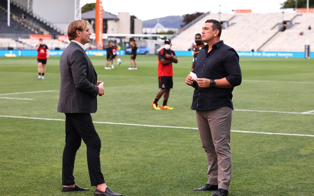Chiefs coach Clayton McMillan and Crusaders coach Scott Robertson.