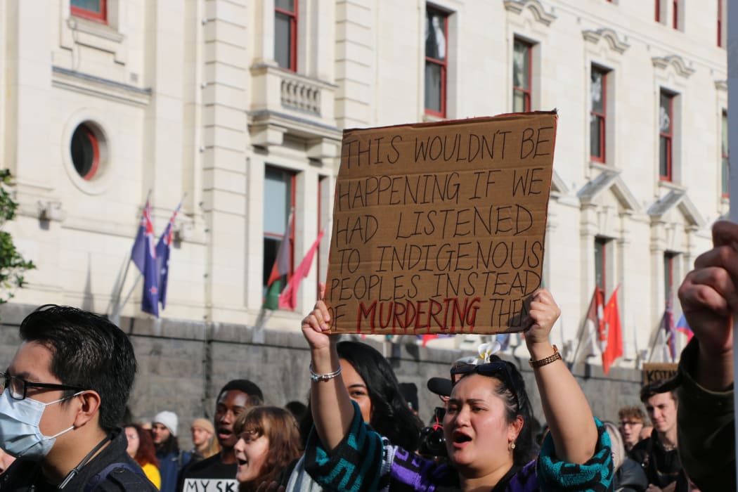 Protesters hold up their signs in Aotea Square, Auckland at the Black Lives Matter rally on 14 June, 2020.