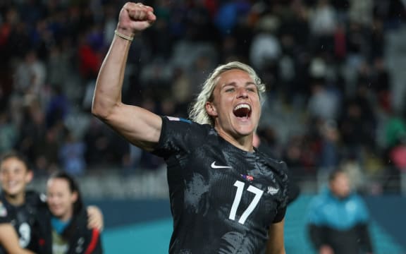 New Zealand's forward #17 Hannah Wilkinson celebrates her team winning the Australia and New Zealand 2023 Women's World Cup Group A football match between New Zealand and Norway at Eden Park in Auckland on July 20, 2023. (Photo by Marty MELVILLE / AFP)