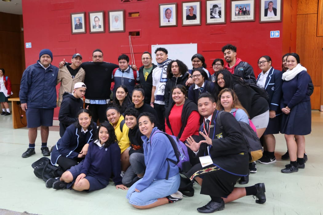 Porirua college students pose with visiting speaker Toeolesulusulu Damon Salesa (Fifth from left in the back row) from Auckland University