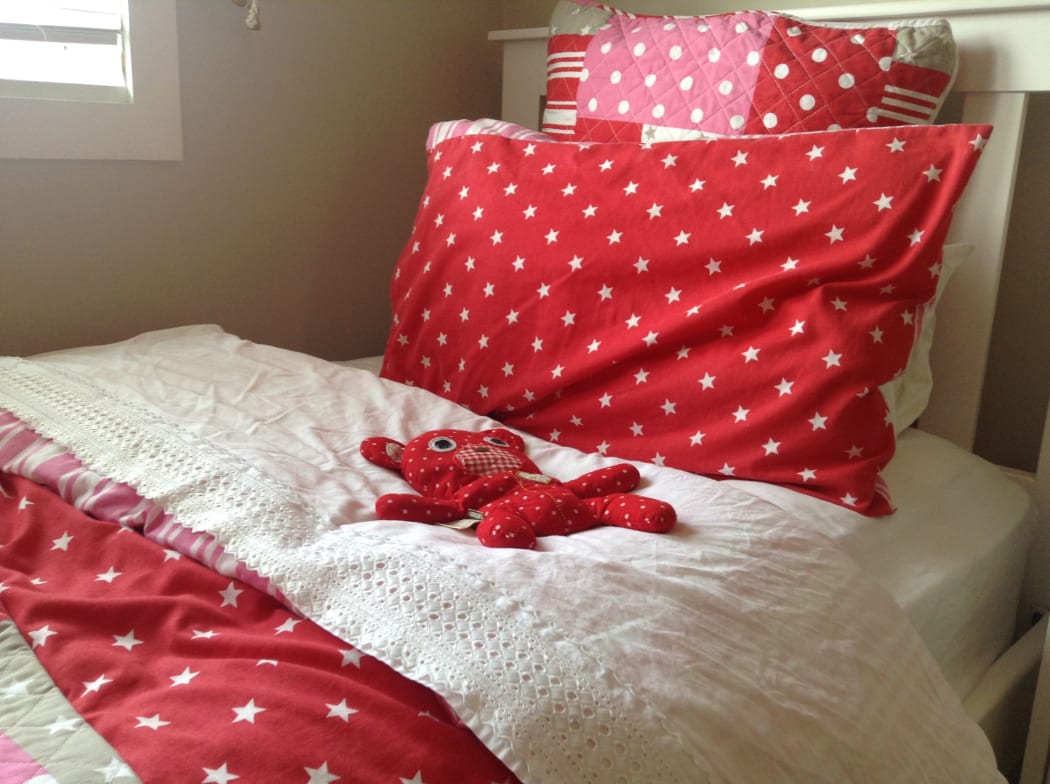 A wheat bag on a child's bed