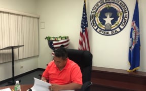 Governor Ralph Torres signs the Budget Bill into law