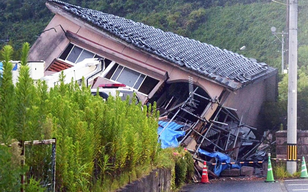 A house is collapsed due to a massive earthquake in Osaki Town, Kagoshima Prefecture, adjacent to Miyazaki Prefecture, on August 8, 2024. At 4:43 p.m. on Aug. 8th, the earthquake measuring magnitude 7.1 occurred off the coast of Miyazaki Prefecture, with its epicenter in the Hyuga-Nada Sea. The Japan Meteorological Agency is investigating whether the earthquake is related to “Nankai megathrust earthquakes.”( The Yomiuri Shimbun ) (Photo by Masato Oyamada / Yomiuri / The Yomiuri Shimbun via AFP)