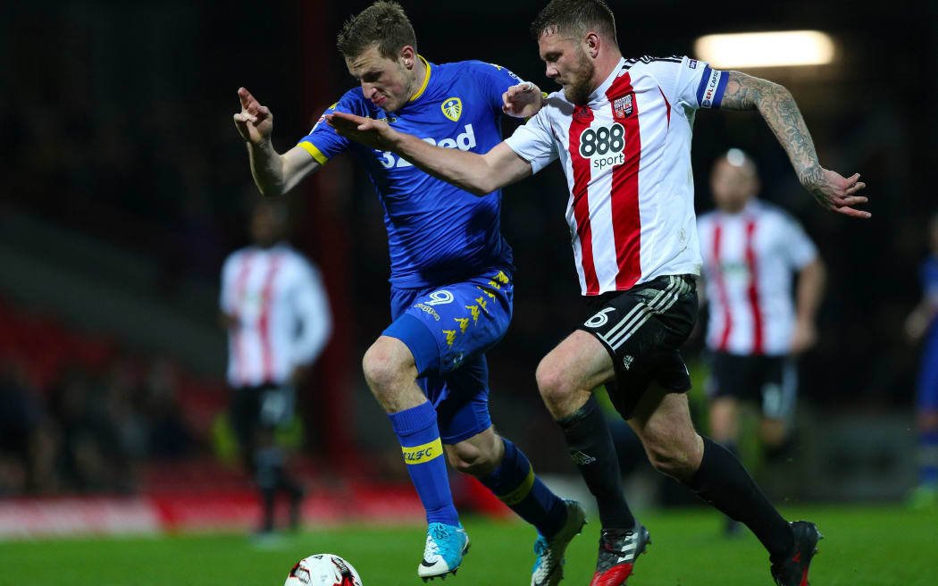 Leeds striker Chris Wood is returning to the premier league with Burnley.