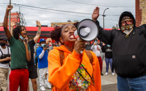 Protesters demonstrate against the death of George Floyd outside the 3rd Precinct Police Precinct on May 27, 2020 in Minneapolis, Minnesota.