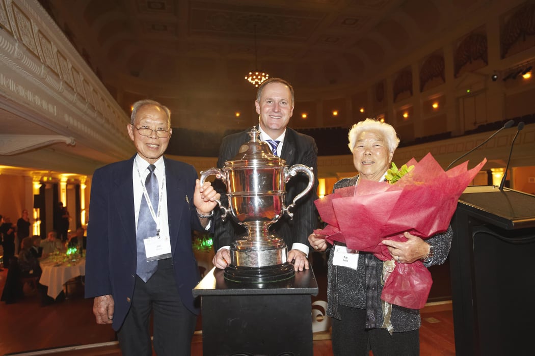 Joe and Fay Gock with the Bledisloe Cup and Prime Minister John Key.