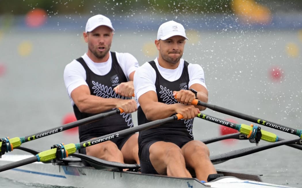 New Zealand's Robbie Manson (L) and New Zealand's Jordan Parry compete in the men's double sculls heats rowing competition at Vaires-sur-Marne Nautical Centre in Vaires-sur-Marne during the Paris 2024 Olympic Games on July 27, 2024. (Photo by Bertrand GUAY / AFP)